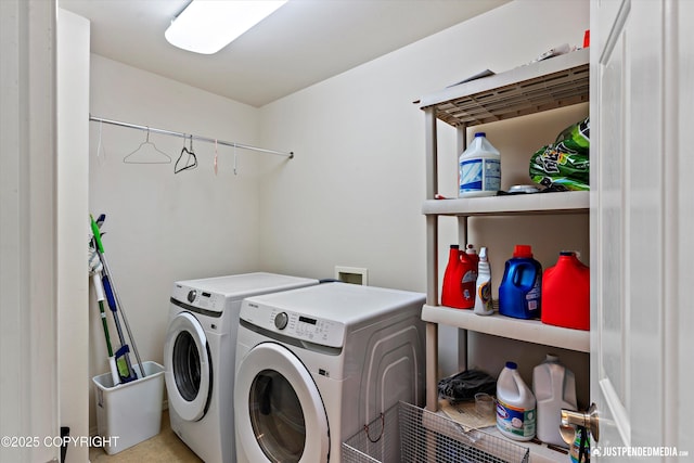 laundry area with separate washer and dryer