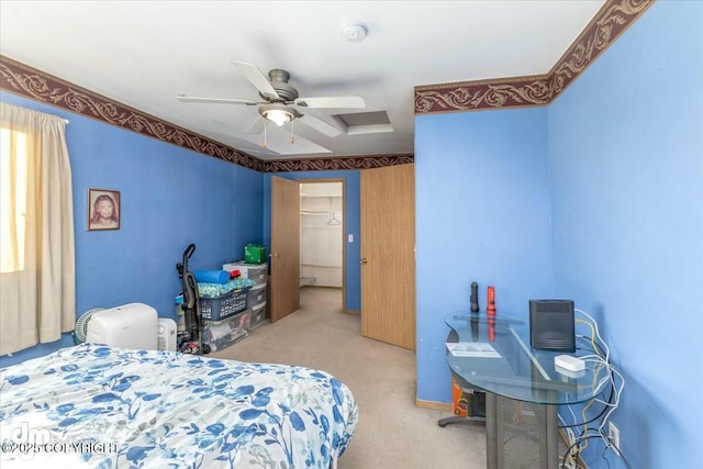 bedroom featuring light colored carpet and ceiling fan