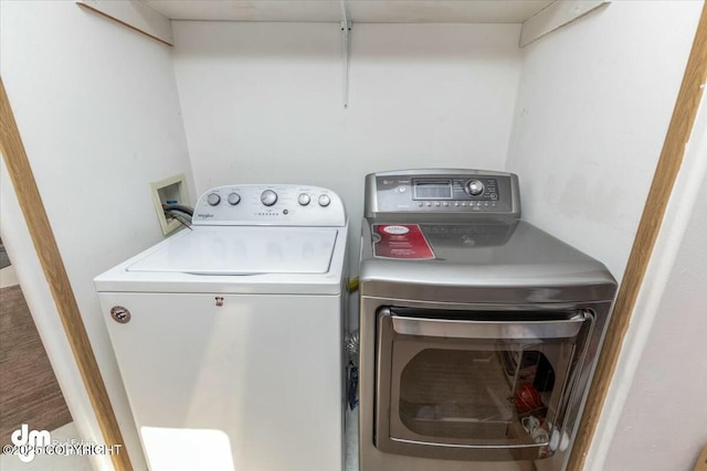 washroom with washer and clothes dryer