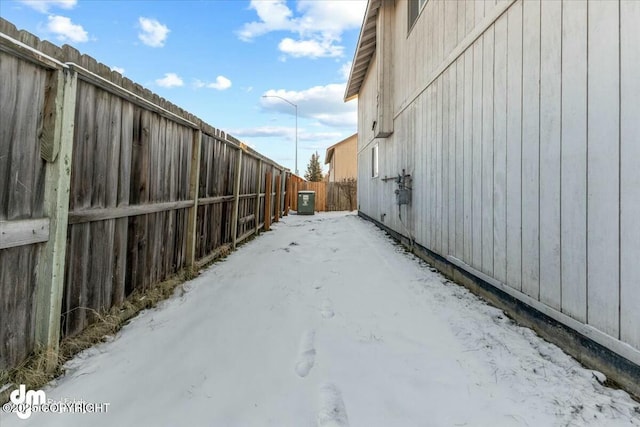 view of yard covered in snow