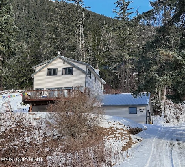 view of front of property featuring a wooden deck