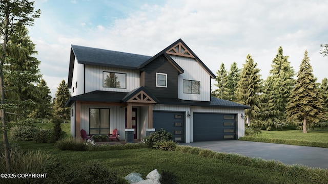 view of front of home featuring a garage and a front lawn