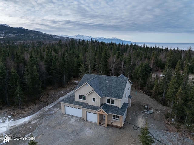 14566 Rockingham Cir, Anchorage, AK 99516 - drone / aerial view with a forest view and a mountain view