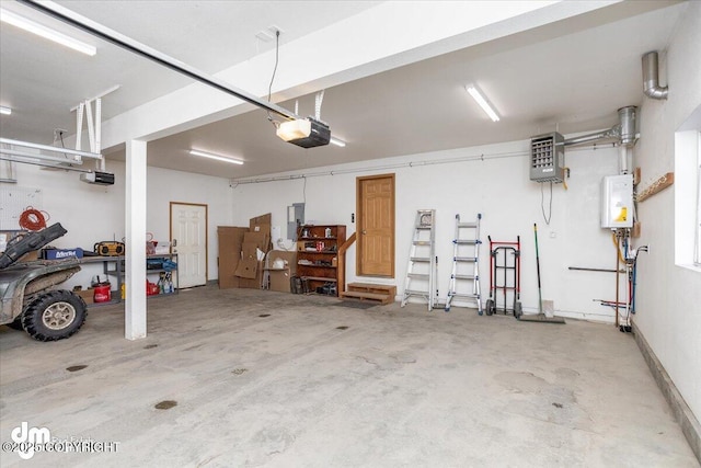 garage featuring a garage door opener and water heater