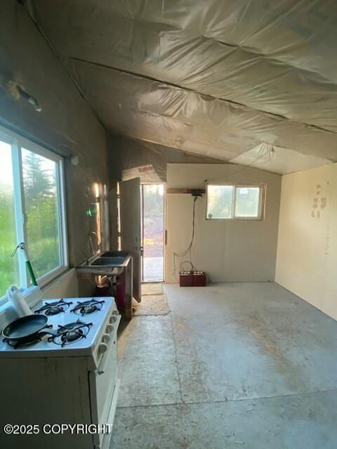32603 Rickard St, Anchor Point, AK 99556 - kitchen featuring white gas range oven and vaulted ceiling