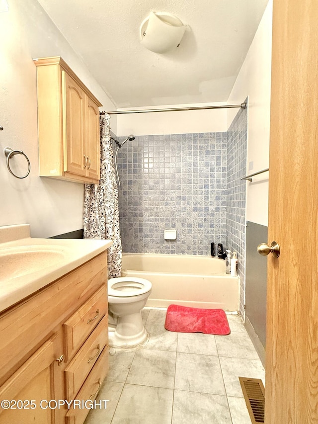 full bathroom with visible vents, toilet, shower / bathtub combination with curtain, tile patterned flooring, and vanity