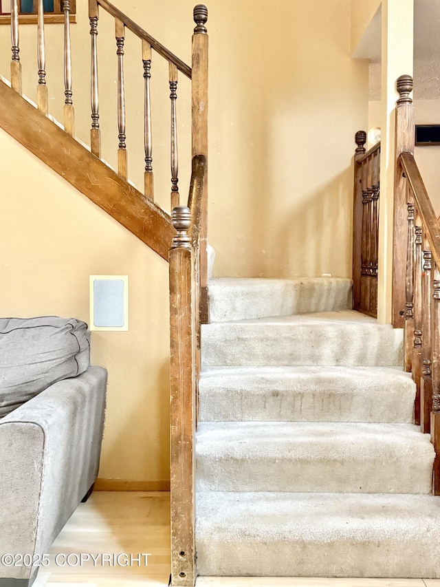 staircase with baseboards