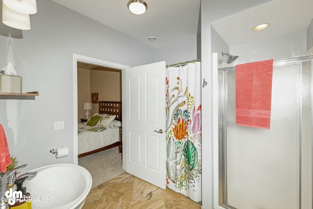 bathroom with sink and walk in shower