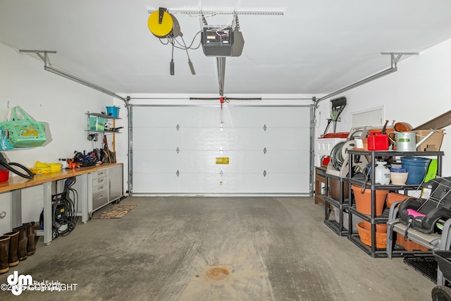garage featuring a garage door opener