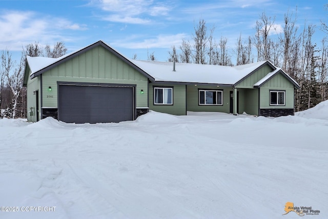 single story home featuring a garage