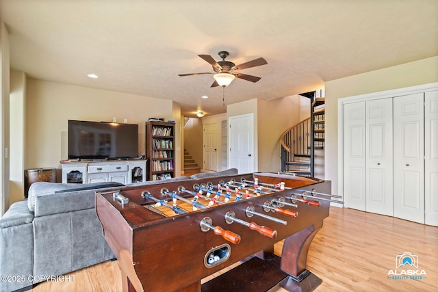 recreation room featuring ceiling fan, wood finished floors, and recessed lighting