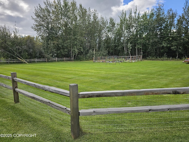 view of yard featuring fence