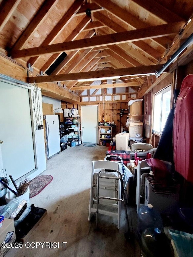 garage with white refrigerator