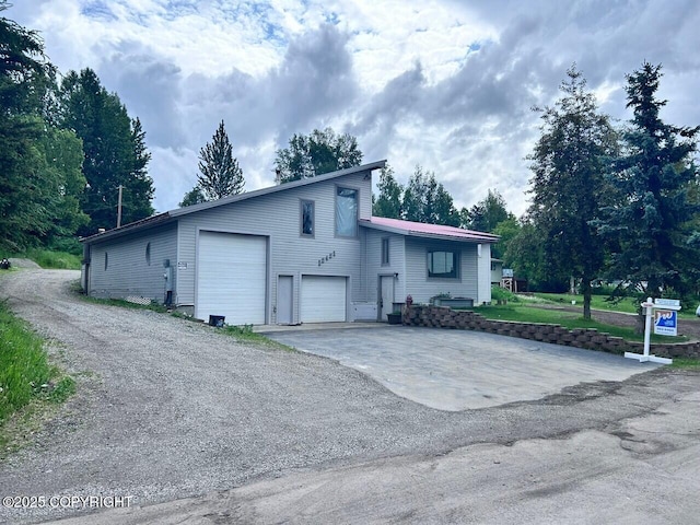 12421 Silver Spruce Dr, Anchorage, AK 99516 - view of front of house with an attached garage