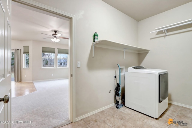 laundry room featuring washer / clothes dryer, a ceiling fan, light carpet, laundry area, and baseboards