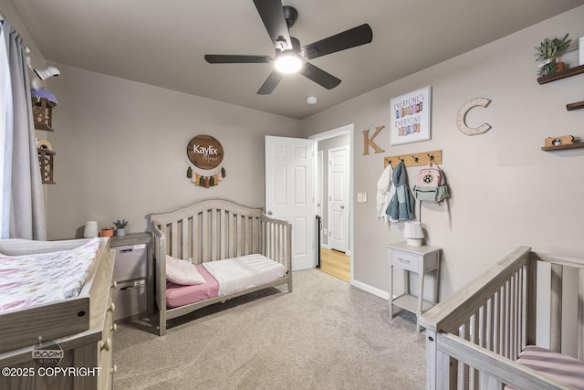 carpeted bedroom with ceiling fan