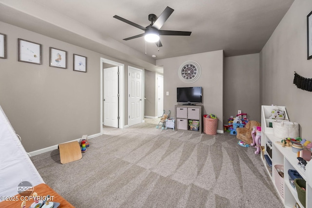 game room featuring ceiling fan and carpet flooring