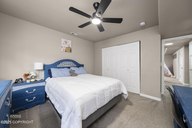 bedroom with a closet, ceiling fan, and carpet