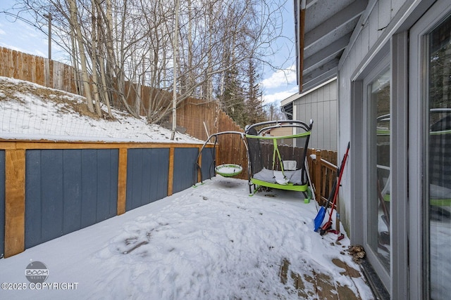 view of yard covered in snow