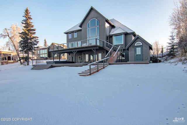 view of snow covered house