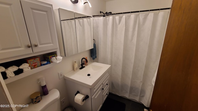 2911 W 34th Ave, Anchorage, AK 99517 - full bathroom with vanity, toilet, and a shower with curtain