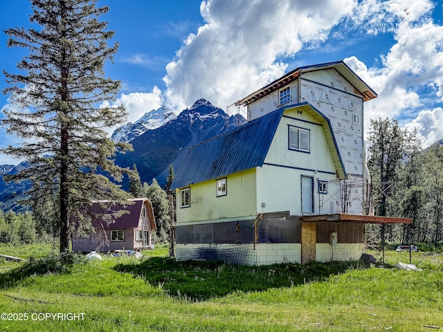 8630 S River Dr, Palmer, AK 99645 - view of side of home featuring a mountain view
