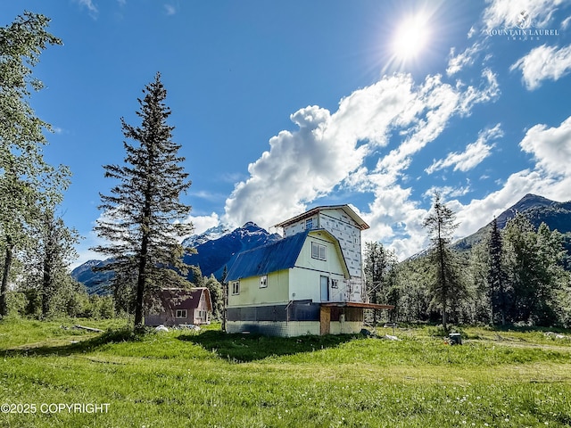 8630 S River Dr, Palmer, AK 99645 - view of side of property featuring a mountain view and a barn
