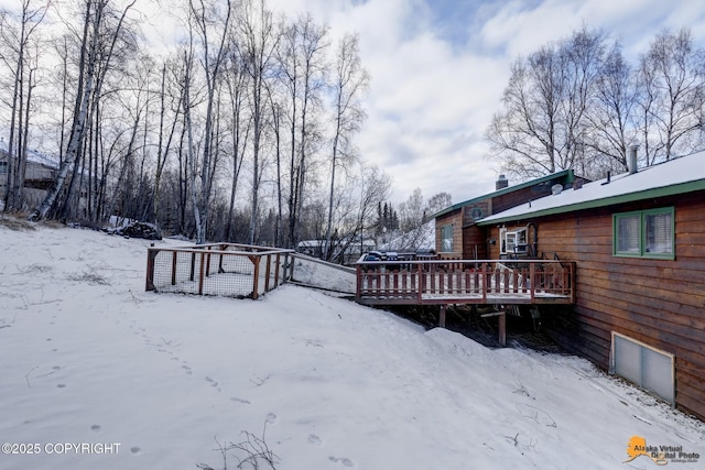 view of snow covered deck