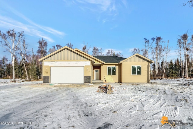 view of front of home with a garage