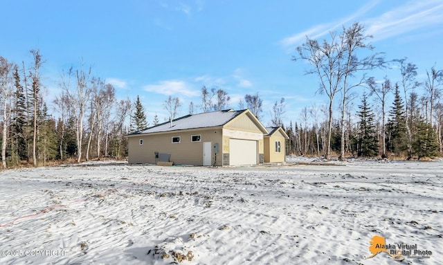 exterior space featuring a garage