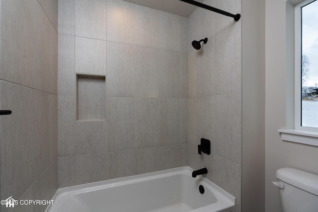 full bathroom featuring  shower combination and toilet