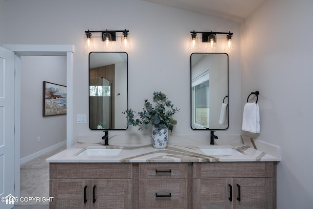 11093 Red Sky Cir, Anchorage, AK 99516 - bathroom with double vanity and lofted ceiling