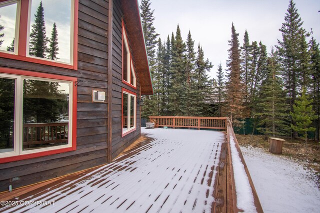 view of snow covered deck