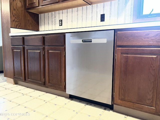 2707 W 31st Ave, Anchorage, AK 99517 - kitchen with dishwasher, light floors, dark brown cabinets, and light countertops