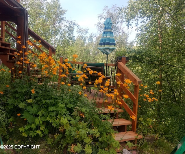 view of playground featuring a wooden deck