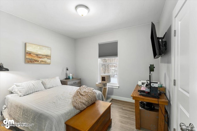 bedroom featuring light wood-type flooring