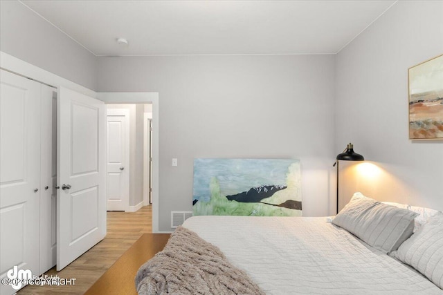 bedroom featuring light hardwood / wood-style flooring