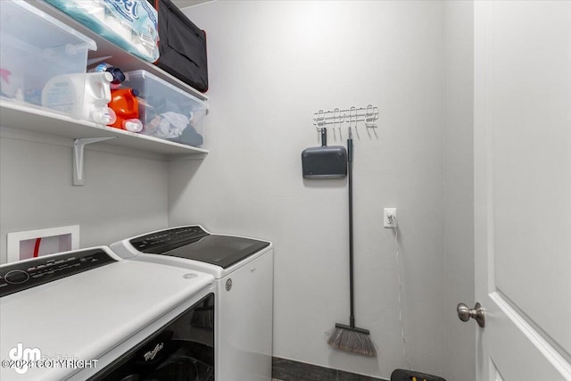 washroom with independent washer and dryer