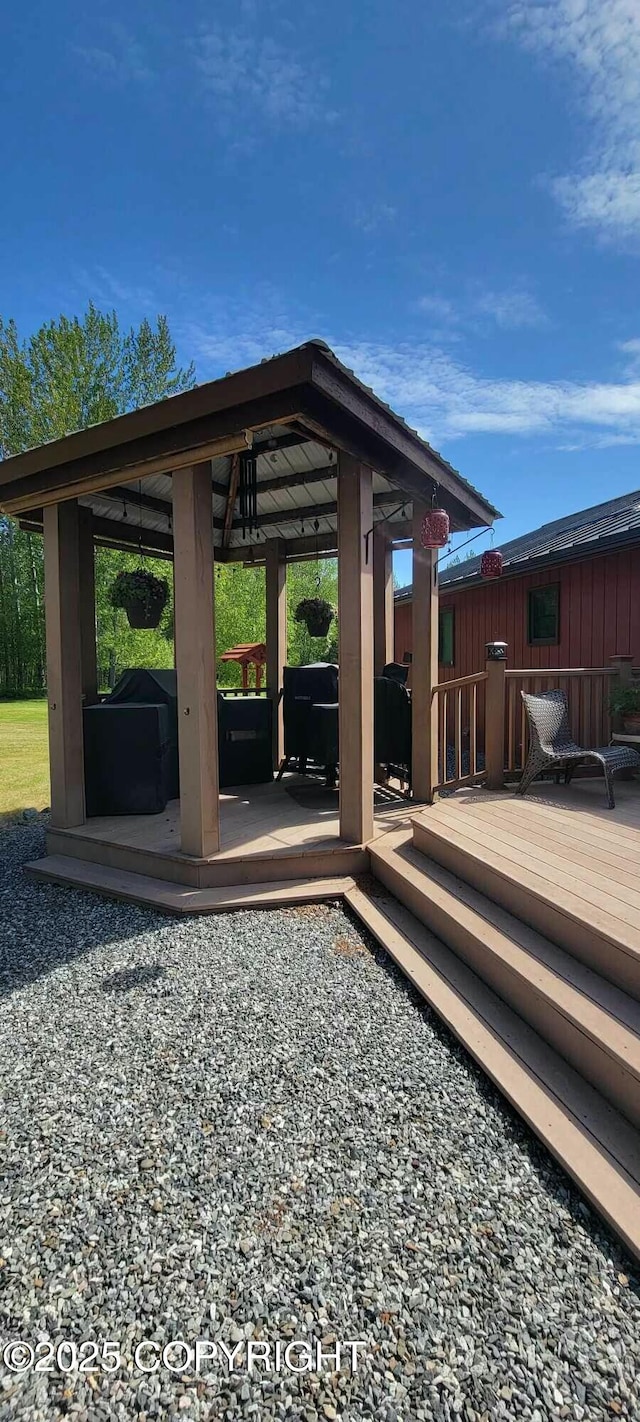 wooden deck with a gazebo