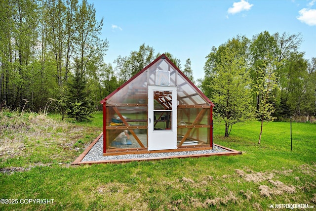 5853 E Edgerton Parks Rd, Palmer, AK 99645 - view of greenhouse featuring a yard