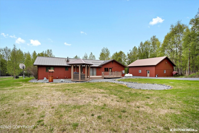 5853 E Edgerton Parks Rd, Palmer, AK 99645 - back of house featuring a gazebo, a lawn, and a metal roof