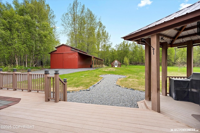5853 E Edgerton Parks Rd, Palmer, AK 99645 - wooden deck featuring a yard, an outdoor structure, and a gazebo