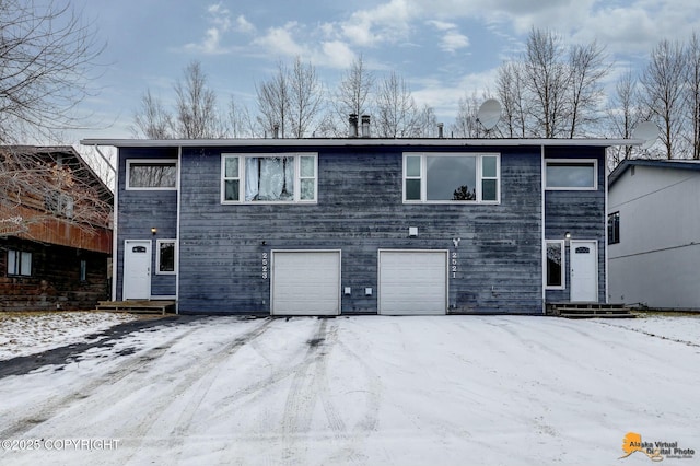 view of front of house with a garage