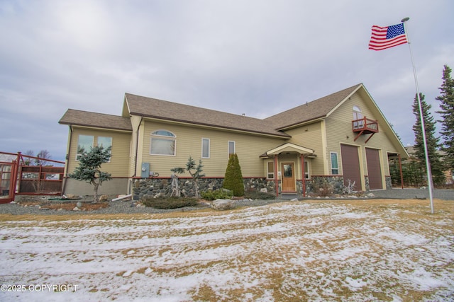 view of front of property with a garage