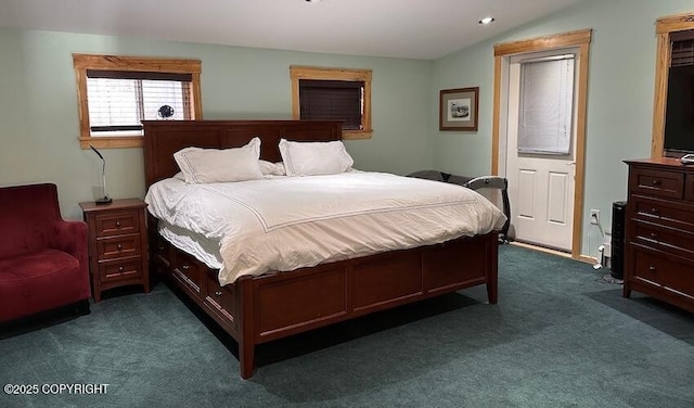 bedroom with lofted ceiling, dark carpet, and recessed lighting