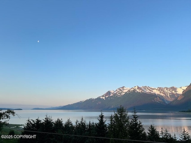 mountain view with a water view