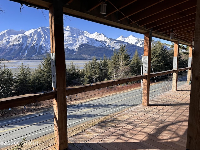 wooden terrace featuring a mountain view