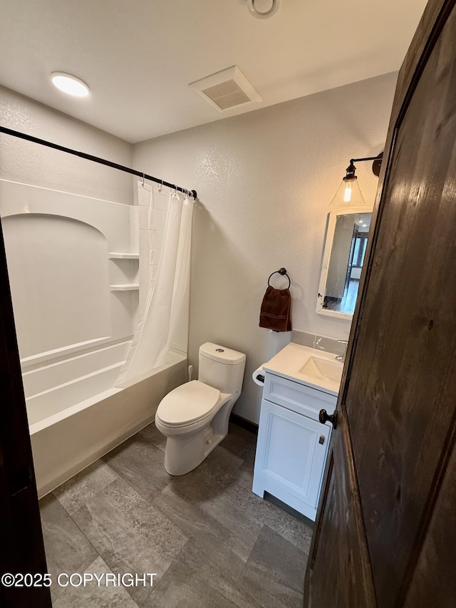 full bathroom featuring shower / bath combination with curtain, vanity, and toilet