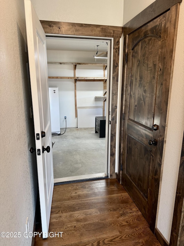 hall with dark hardwood / wood-style flooring