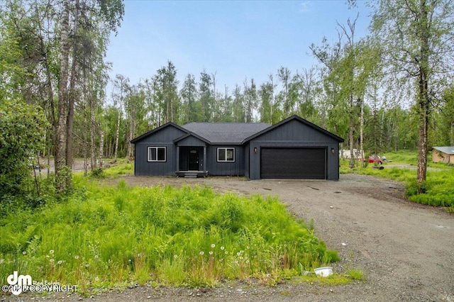 single story home with a garage